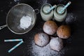 Jelly doughnuts and two bottles of milk Royalty Free Stock Photo