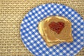 Jelly heart on peanut butter sandwich