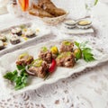 Jelly with meat, aspic beef, traditional Russian dish, portion on a plate, mustard and horseradish. Restaurant serving. Selective Royalty Free Stock Photo