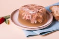Jelly with meat, beef aspic, traditional dish. portion on plate. Bread and chili Royalty Free Stock Photo