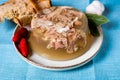 Jelly with meat, beef aspic, traditional dish. portion on plate. Bread and chili Royalty Free Stock Photo