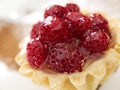 Jelly raspberry tartlet, close up photo