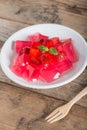 Jelly strawberry with fresh strawberry slices.