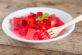 Jelly strawberry with fresh strawberry slices.