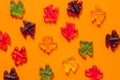 Jelly sweets, colorful marmalade airplanes on oarange background. Open pattern Royalty Free Stock Photo