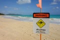 Jellyfish warning sign on beautiful hawaii beach