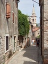 Jelsa, Croatia - July 25, 2021. Narrow, historic street in the old town on the island of Hvar Royalty Free Stock Photo
