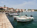 Jelsa, Croatia - July 25, 2021. Old town and promenade full of tourists at the port of the resort on the island of Hvar Royalty Free Stock Photo