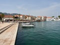 Jelsa, Croatia - July 25, 2021. Old town and promenade full of tourists at the port of the resort on the island of Hvar Royalty Free Stock Photo