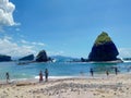 Jember, Indonesia - January 2023 : visitors enjoy papuma jember beach and play in the water