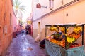 JEMMA DAR FNA, THE MAIN BAZAAR, MARRAKECH, MOROCCO, NOVEMBER 10, 2018. People walking on a corridor surrounded by booths Royalty Free Stock Photo