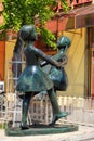 Jena, Germany - May 26, 2023: Dancing girls, a bronze sculpture by Ursula Schneider-Schulz, 1961. Located in Old Town of Jena on