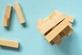 Jenga board game. Tower from wooden blocks Royalty Free Stock Photo