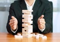 Jenga business game, business fulfillment Building a business base Failed business base Stable and unstable business base.