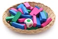 Jenga game of colorful wooden blocks with dice