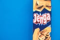 Jenga tower game - wood blocks on blue background