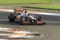 Jenson Button cornering a Vodafone Mclaren MP4-27