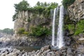 Jeongbang waterfall is the only waterfall in Asia that fall direct into the ocean. Jeju, South Korea Royalty Free Stock Photo