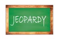 JEOPARDY text written on green school board