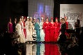 JEREZ DE LA FRONTERA, SPAIN - FEB 9: Models walk on the Faly, de la Feria al Rocio catwalk during the Pasarela Flamenca Jerez Royalty Free Stock Photo