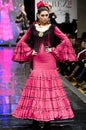 JEREZ DE LA FRONTERA, SPAIN - FEBRUARY 9: Models walk on the Carmen Vega catwalk during the Pasarela Flamenca Jerez 2014 Royalty Free Stock Photo