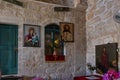 Icons hang on the walls of the Monastery Deir Hijleh - Monastery of Gerasim of Jordan, in the Palestinian Authority, in Israel