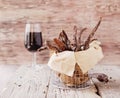 Jerked meat, cow, deer, wild beast or biltong with wine bowls on a rustic table, selective focus