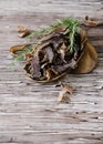 Jerked meat, cow, deer, wild beast or biltong in wooden bowls on a rustic table