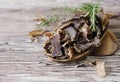 Jerked meat, cow, deer, wild beast or biltong in wooden bowls on a rustic table