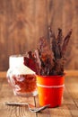 Jerky beef in orange dish - homemade dried cured spiced meat