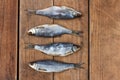 Jerky fish, beer snacks. Dried fish on wooden boards, top view with space