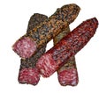 Jerky pork sausage with spices, similar to fouettes, chorizo and saucisson. Closeup of charcuterie meat products food photography