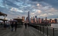 Jersey City, NJ / USA - April 2016: a view of Manhattan skyline and Hudson river at dusk from Jersey City pier Royalty Free Stock Photo