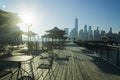 Jersey City, NJ / USA - 6/28/20: J Owen Grundy Park, a riverfront pier facing the NYC skyline features game tables & a pavilion Royalty Free Stock Photo