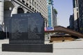 Jersey City, NJ / USA - 6/28/20: The 9/11 Memorial a steel girder labeled #8 and a black granite plaque that reflects the New York