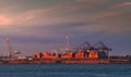 Jersey Port. Sunset view with crane silhouettes from the docking yard between Staten Island and Manhattan