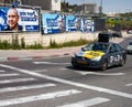 Campaign car for Israeli orthodox party in the street