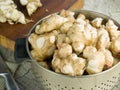 Jerusalem artichokes in a colander