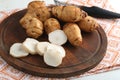 Jerusalem artichokes on a cutting board Royalty Free Stock Photo