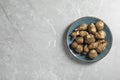 Jerusalem artichokes on light grey marble table, top view. Space for text Royalty Free Stock Photo