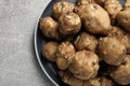 Jerusalem artichokes on light grey table, top view. Space for text Royalty Free Stock Photo