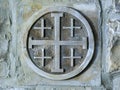 Jerusalem cross with five crosses on the wall of church in Israel