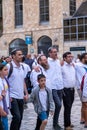 Jerusalem, Israel - 10 April, 2023. Bar Mitzvah, Jewish coming of age ancient ritual for boys Procession with, happy parents,