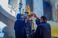 Coptic priests lighting oil candles, Good Friday, Holy Sepulchre church