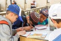 Children writing notes to put in a Wailing Wall in Jerusalem,Israel Royalty Free Stock Photo