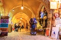 JERUSALEM, ISRAEL - APRIL 2017: Tourists walk trough the market in the old city of Jerusalem