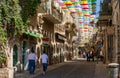 Jerusalem, Israel, August 5th. 2016 - Multicolored umbrellas above the street Yoel Moshe Salomon in Jerusalem, district Nachalat