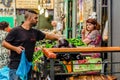 Jerusalem, Israel-August 16, 2016: Woman selling man vegetables at market in Jerusalem, Israel