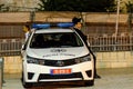 Jerusalem/Israel- August 17, 2016: Young Jewish Orthodox man leaning on police car in Jerusalem, Israel