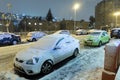 Cars parked on Shahal Street in Givat Mordechai are covered in snow, during a snowstorm on the night of February